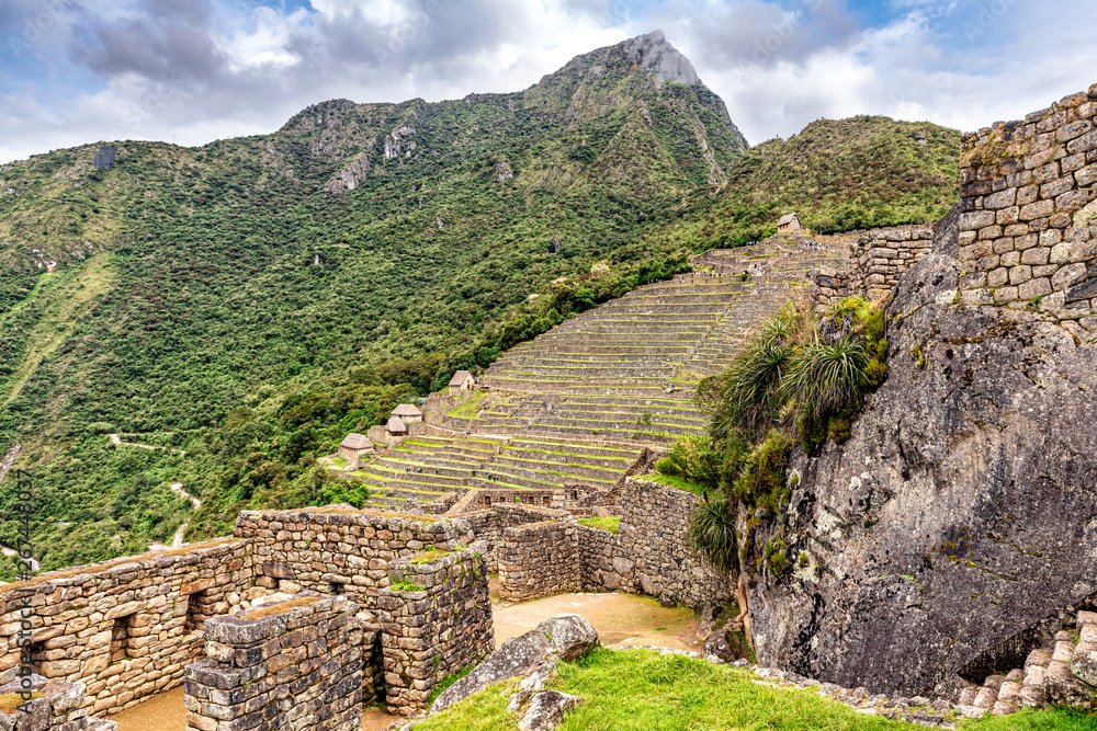 Houses and terraces in Incas city of Machu Picchu in Peru.