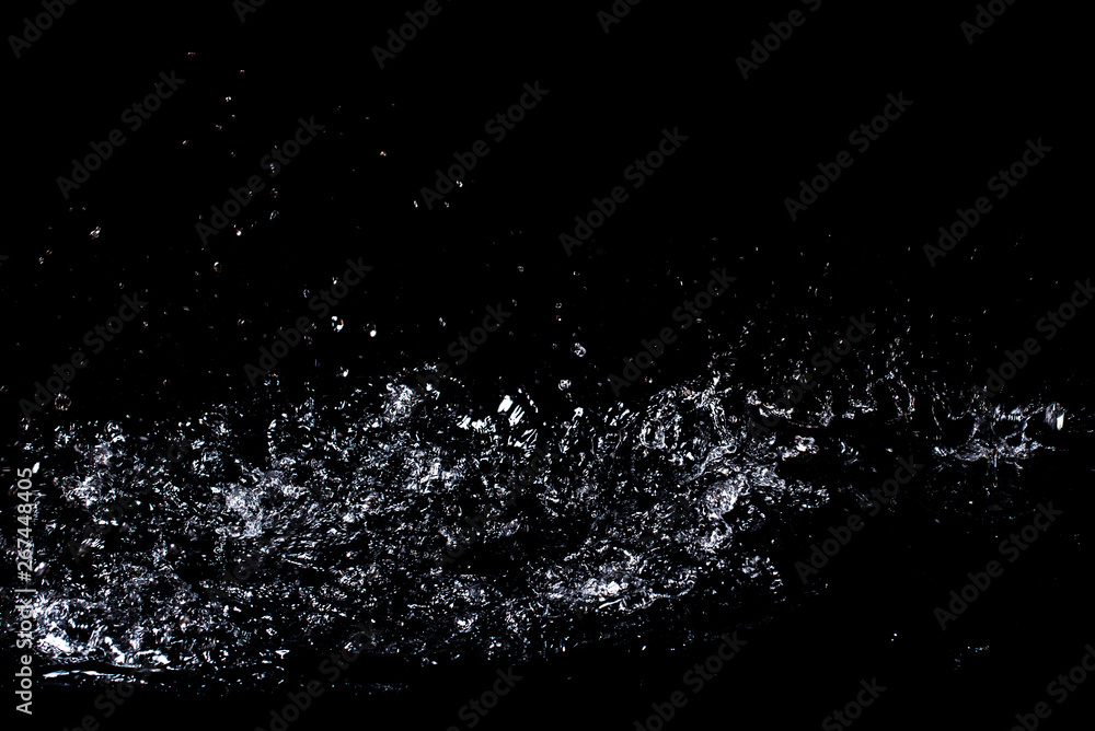 Splash of water. Isolate on black background Splash of water. Isolate on black background
