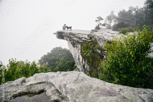 Hiker at McAfee Knob Along the Appalachian Trail on Catawba Mountain in Virginia photo