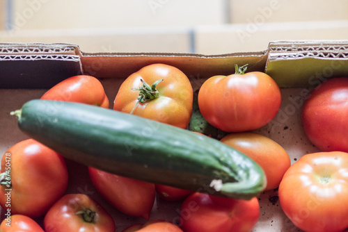 Fresh red organic tomatoes, all good for a healthy juicy vegetarian salad photo