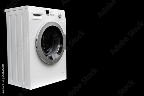 Washing machine isolated on black background. Washing machine isolated over black.