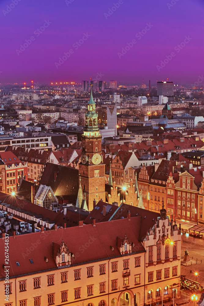 Aerial view of the sunset of Stare Miasto with Market Square, Old Town Hall and St. Elizabeth's Church from St. Mary Magdalene Church in Wroclaw, Poland