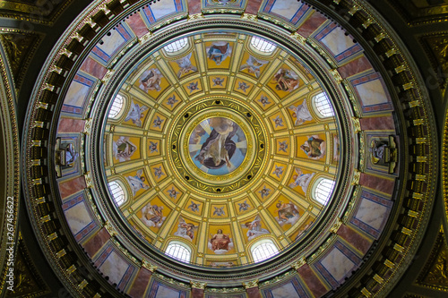 Beautiful paintings on the ancient dome of the famous Basilica of St. Stephen in Budapest, Hungary. Antique painting in Catholic church