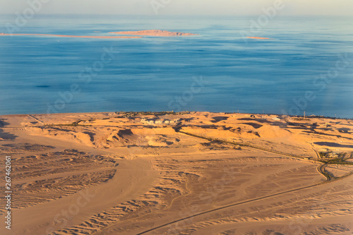 Aerial view on arabian desert and Red sea from the airplane