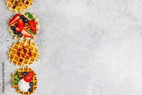 Traditional belgian waffles with fresh berries