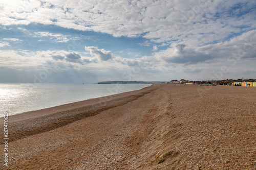 Looking along an empty Seaford beach in Sussex  towards Newhaven