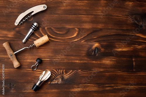 A wine accessories on wooden background.
