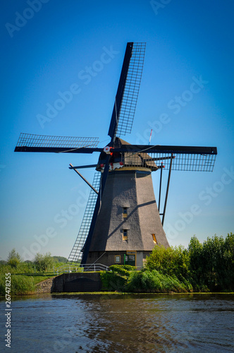 Mills by the River in Kinderdijk (Netherlands)
