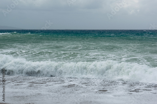 Waves in a bay of the Aegean Sea in Rhodes.