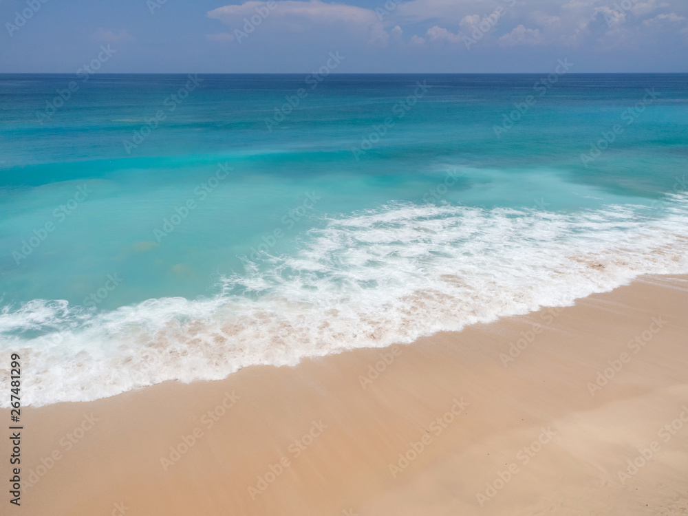 beach with waves in island of Bali 