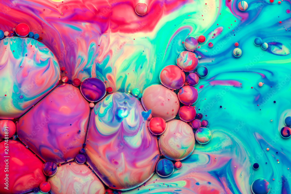 Macro photography of colorful bubbles in some fluids producing vibrant fleeting microworlds that are eternalized in a picture. Macro photography of colorful bubbles in some fluids producing vibrant fleeting microworlds that are eternalized in a picture.