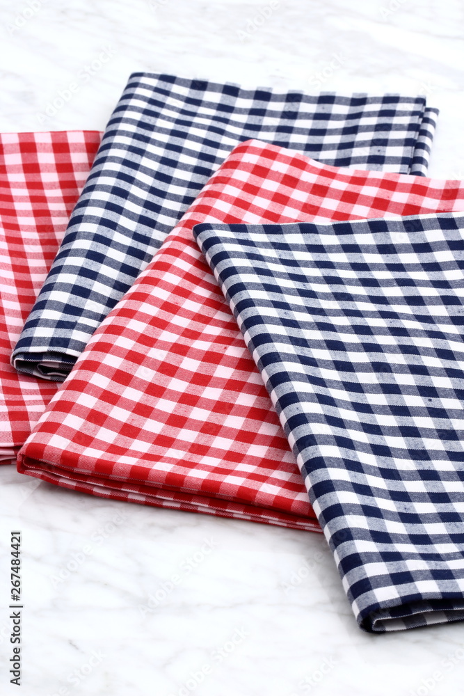 set of fabric napkins on marble countertop set of fabric napkins on marble countertop