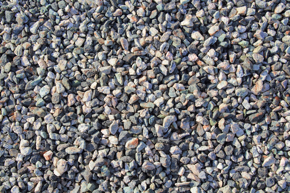 Small colored gravel. Close-up. Background. Texture. Small colored gravel. Close-up. Background. Texture.