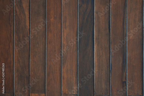 Dark brown wood texture with natural striped pattern background