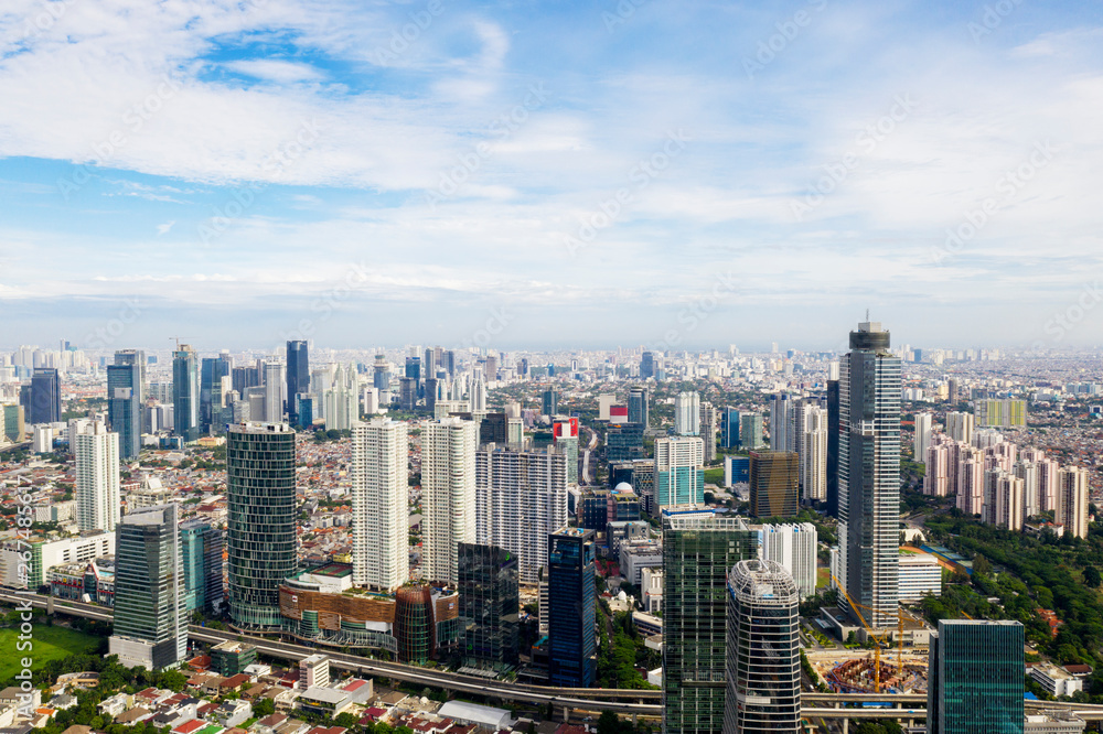 Fototapeta premium Beautiful modern skyscrapers under blue sky