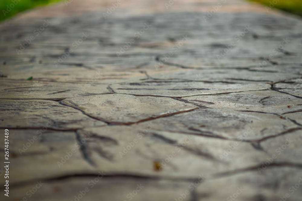Close up view of walkway concrete stamped material, selective focus. Close up view of walkway concrete stamped material, selective focus.