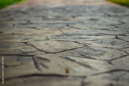 Close up view of walkway concrete stamped material, selective focus.