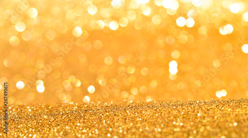 sparkles of golden glitter abstract background 