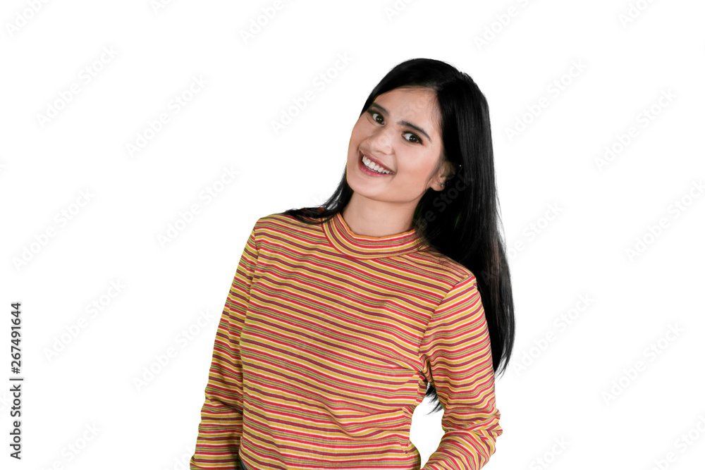 Pretty girl smiling at the camera on studio Pretty girl smiling at the camera on studio
