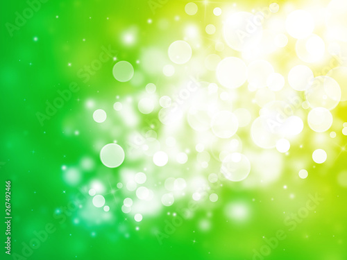 Gold and Green sparkle rays lights with bokeh elegant abstract background. Dust sparks background.