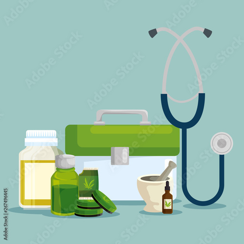 cannabis medicine oil bottles with ointment and stethoscope
