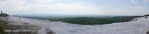 Panoramic view of the beautiful white Travertines terrace of Pamukkale landscape