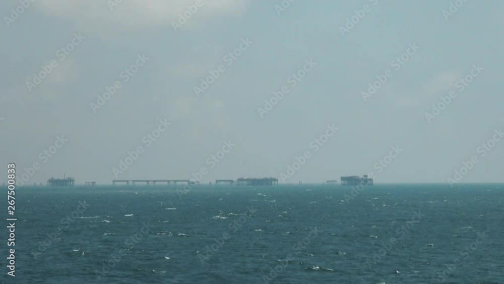 Oil Platform in Caspian Sea Offshore Oil Rig Drilling Platform Off the Baku, Azerbaijan. View From Ship Oil Platform in Caspian Sea Offshore Oil Rig Drilling Platform Off the Baku, Azerbaijan. View From Ship