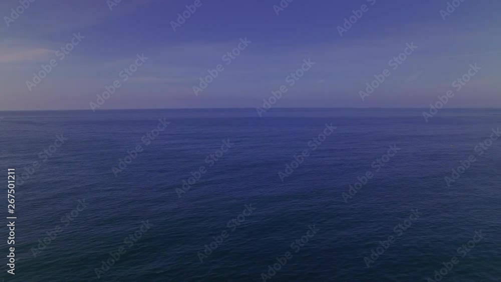 A right directional pan over the blue ocean. A right directional pan over the blue ocean.