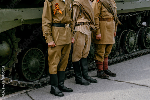 VERKHNYAYA PYSHMA, RUSSIA - 9 MAY 2019: The clothes of a Soviet soldier during the great Patriotic war with fascist 1941-1945, boots and puttees photo