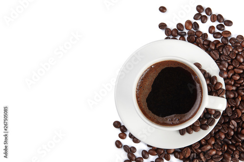 A cup of coffee and coffee beans isolated on white background.