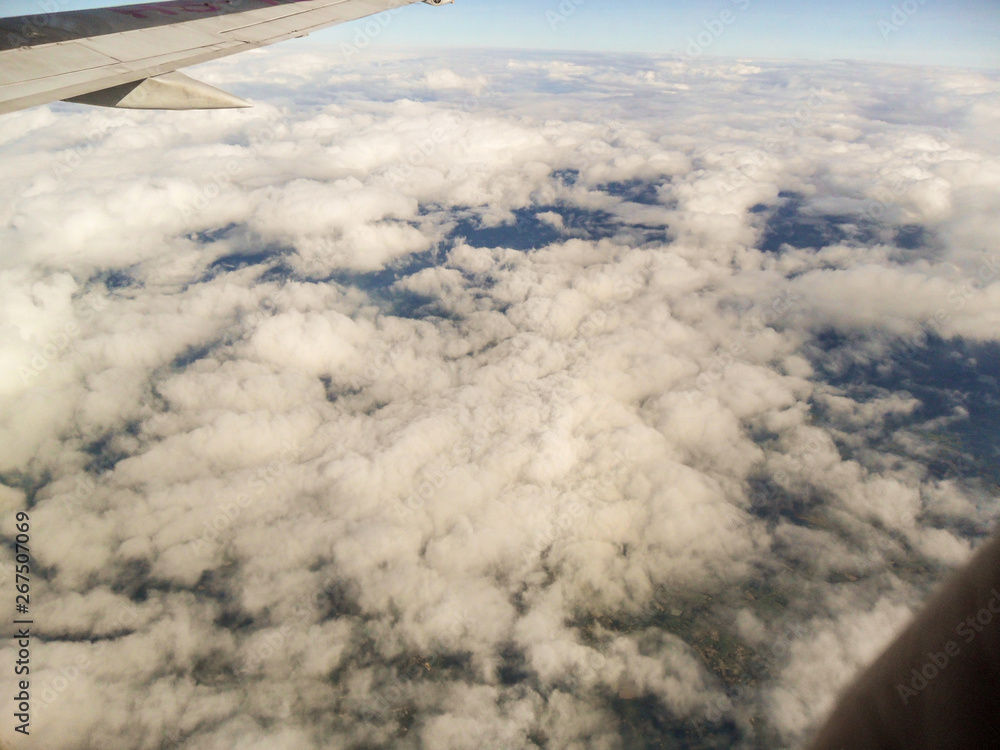 Fototapeta premium The beautiful blue sky and white cloud from the plane In Thailand