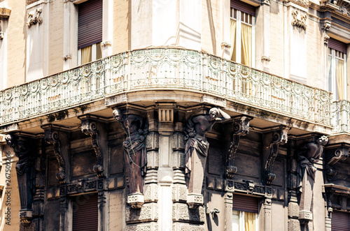 Decoration stucco of balcony in old baroque building in Catania, traditional architecture of Sicily, Italy.