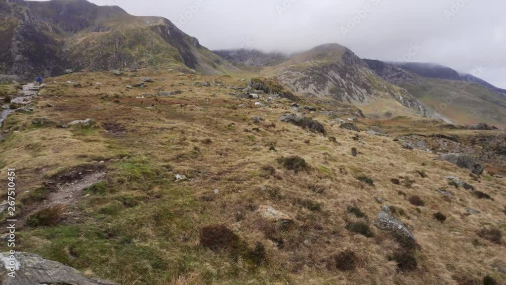 panning over Cwm Idwal, beautiful landscape in Snowdonia National Park, North Wales on a wet windy day panning over Cwm Idwal, beautiful landscape in Snowdonia National Park, North Wales on a wet windy day