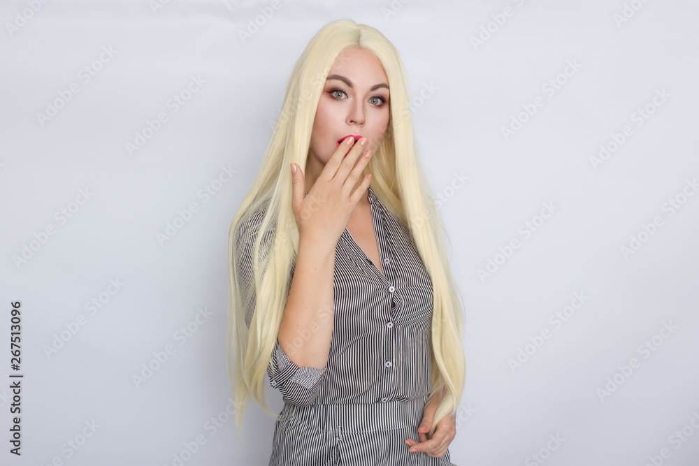 blonde woman in trendy shirt and pants posing blonde woman in trendy shirt and pants posing
