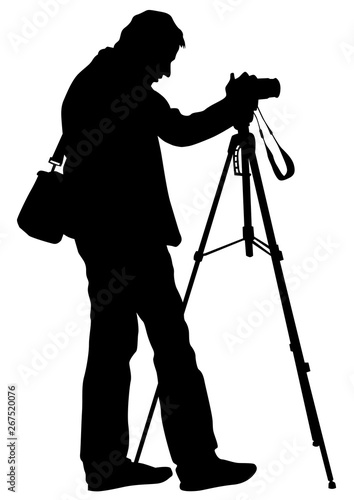 Man with a camera on white background