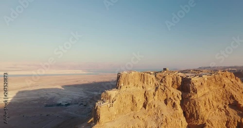 Flying Around the Masada Cliif in the Desert photo