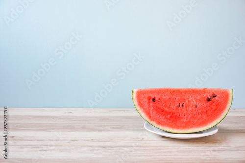 Watermelon on the table. Watermelon on a plate. テーブルの上のスイカ。皿の上のスイカ。