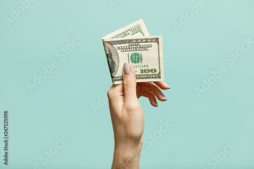 American Dollars Cash Money. 100 dollars banknotes in the background.