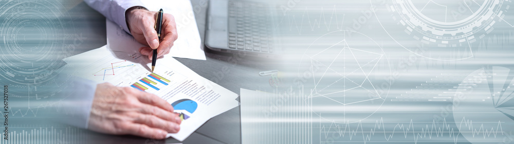 Businessman working on charts. panoramic banner Businessman working on charts. panoramic banner