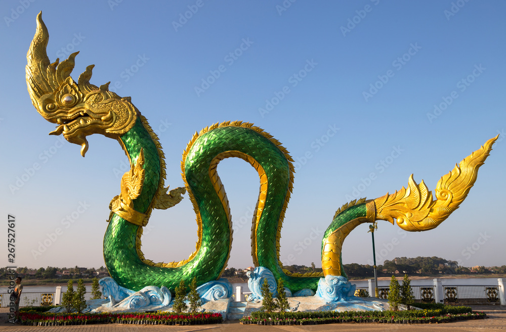 Fototapeta premium NONG KHAI, THAILAND, JANUARY 29, 2019 - Naga Statue in Nong Khai on Mekong River, Thailand.