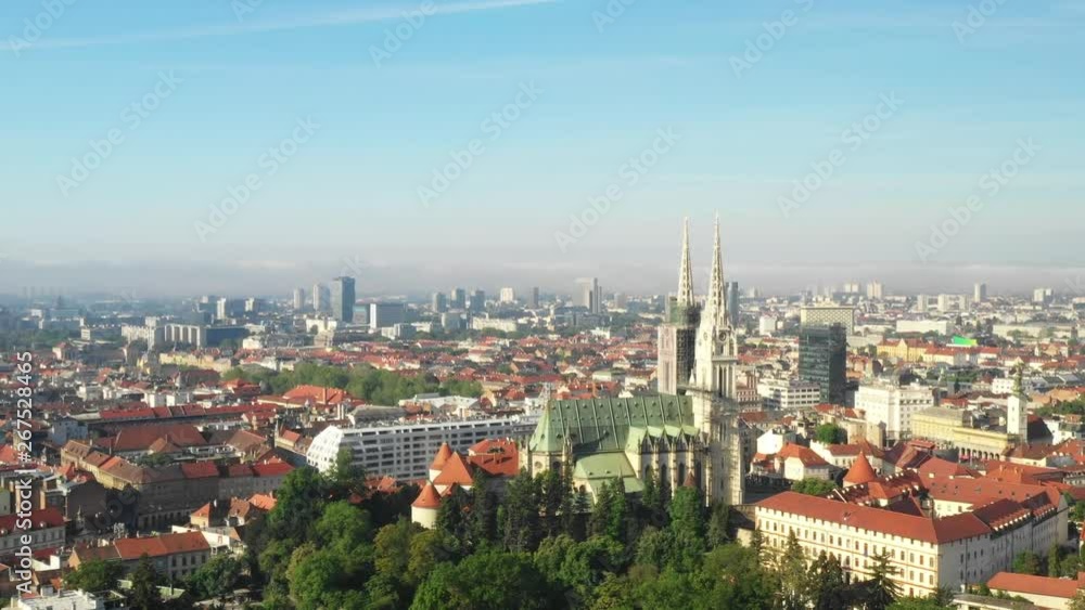 Zagreb, capital of Croatia, city center aerial view from drone, towers of gothic catholic cathedral, rising reveal shot Zagreb, capital of Croatia, city center aerial view from drone, towers of gothic catholic cathedral, rising reveal shot