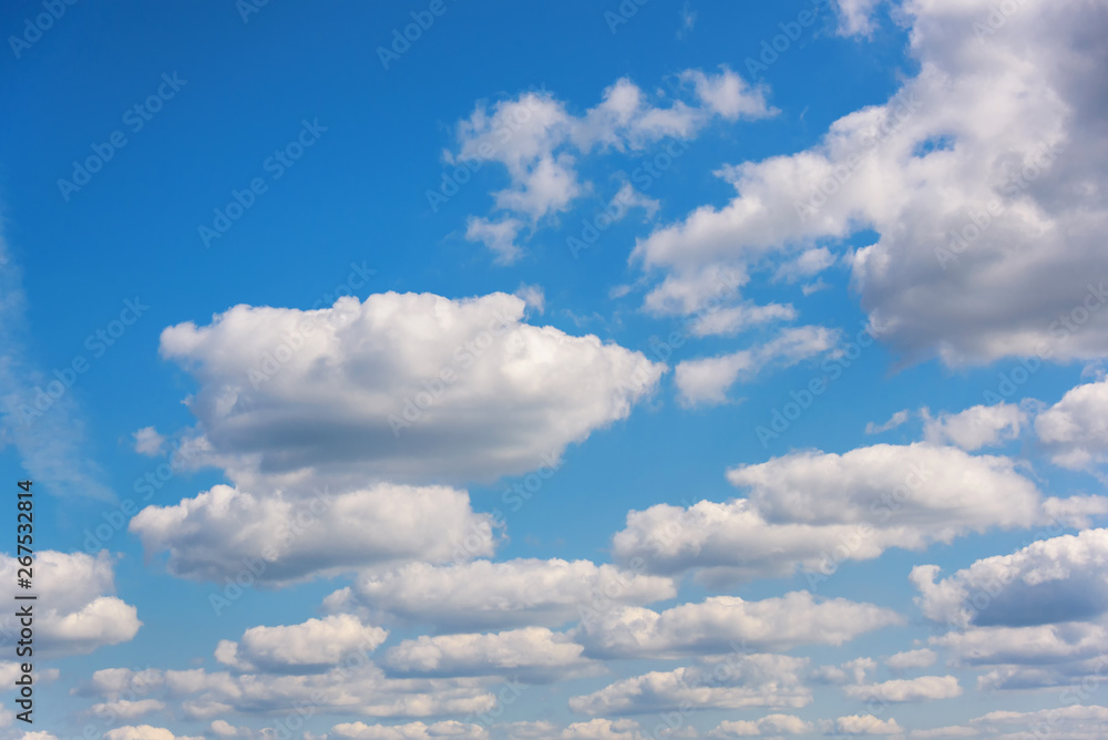 Heavenly daylight on a sunny summer day. The natural composition of the blue sky. Design element or background. Heavenly daylight on a sunny summer day. The natural composition of the blue sky. Design element or background.