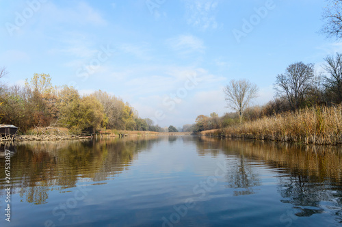 Beautiful landscape photo of Holt-Tisza river and riverside in Hungary. Autumn forest morning fog. Best place for fishing.