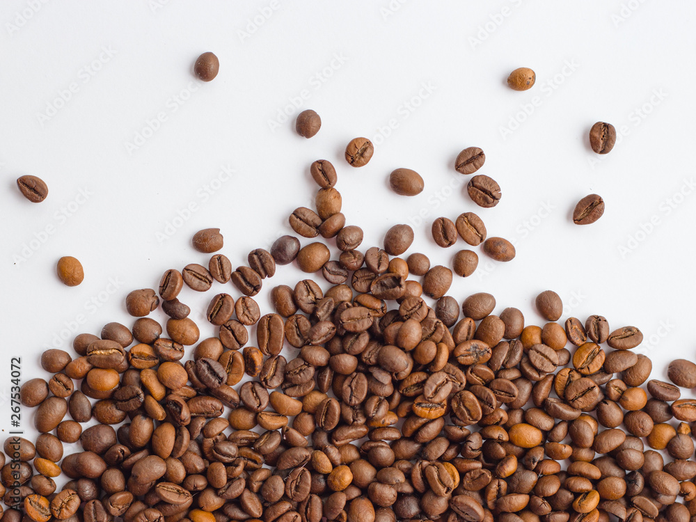 Coffee beans isolated on white background with copy space for text, macro