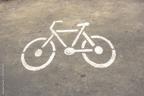 signs bicycle on cement road