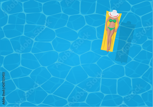 Summer relax concept. Top view on the swimming pool with sexy girl with hat