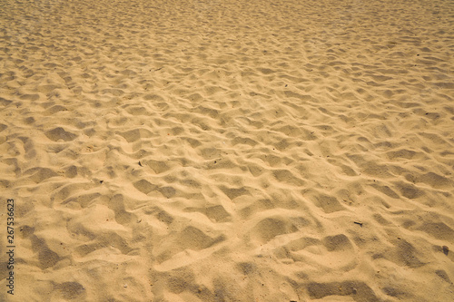 closeup of sand pattern of a beach in the summer