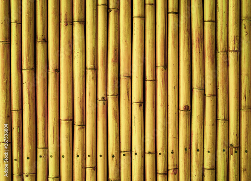 Fototapeta Naklejka Na Ścianę i Meble -  old brown tone bamboo plank fence texture for background