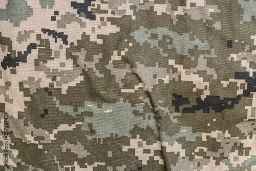 Closeup of military uniform surface.