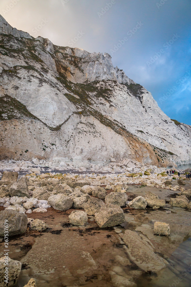 The rocky beach and cliffs near Beachy Head in Sussex, with evening light The rocky beach and cliffs near Beachy Head in Sussex, with evening light